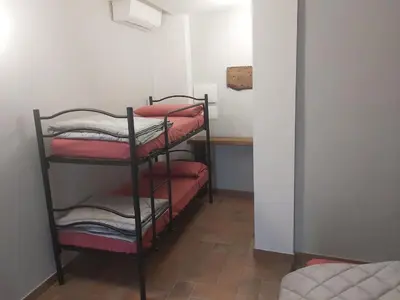 Letto o letti in una camera di B&B La Casa sul Fiume