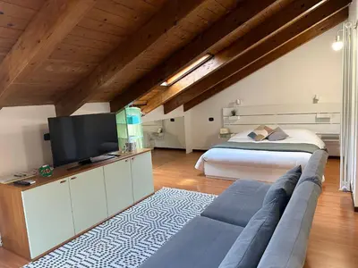 Letto o letti in una camera di Sky Attic a Reggio Emilia