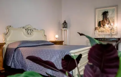 Letto o letti in una camera di PALAZZO Bed and Breakfast