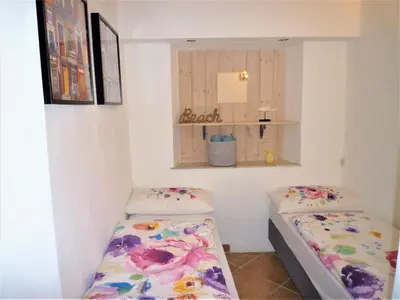 Letto o letti in una camera di Fraseneggi