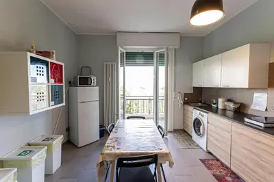 Cucina o angolo cottura di FARE BnB - Room del Parco