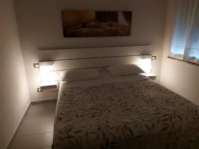 Letto o letti in una camera di FARE BnB - Room del Parco