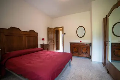 Letto o letti in una camera di Il podere di Emore - Locazione turistica