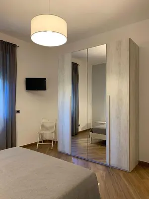 Letto o letti in una camera di La Casa dei Nonni