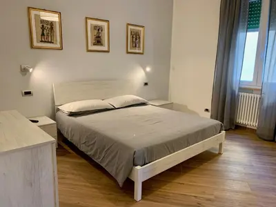 Letto o letti in una camera di La Casa dei Nonni