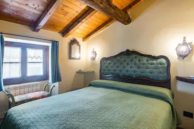 Letto o letti in una camera di GuestHost - Nearby 5 Terre Lovely Mansarda