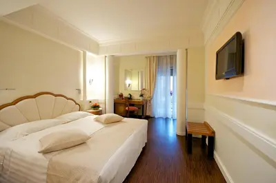 Letto o letti in una camera di Hotel Stendhal