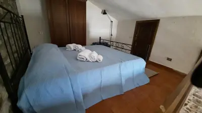 Letto o letti in una camera di La Casetta