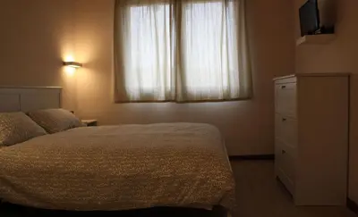 Letto o letti in una camera di Cascina Bosco Gerolo