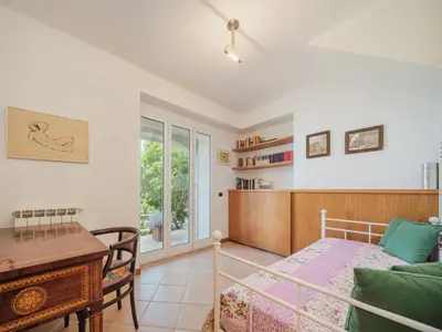Letto o letti in una camera di Apartment Lambrusca by Interhome