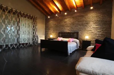Letto o letti in una camera di B&B Cascina Quaderna