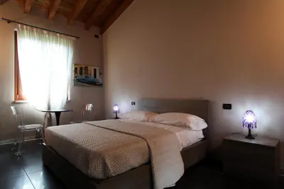 Letto o letti in una camera di B&B Cascina Quaderna