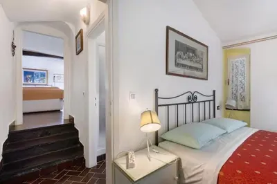 Letto o letti in una camera di Vecchio Mulino Fontona Girasole