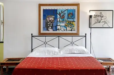 Letto o letti in una camera di Vecchio Mulino Fontona Girasole