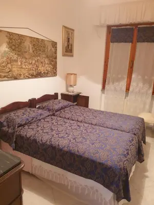 Letto o letti in una camera di CasaMarvi