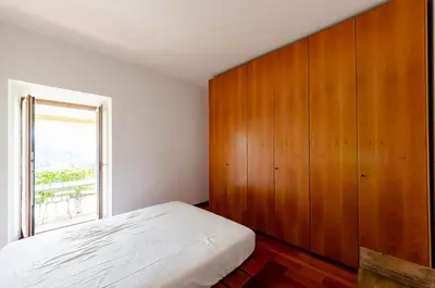 Letto o letti in una camera di JOIVY Inviting Flat with Garden and Sea View in Rapallo