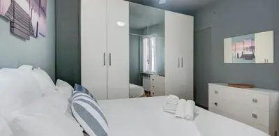 Letto o letti in una camera di Nel blu dipinto di blu Apartment