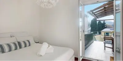 Letto o letti in una camera di Nel blu dipinto di blu Apartment