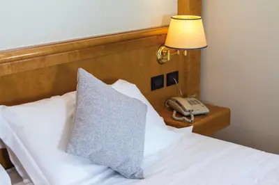Letto o letti in una camera di Hotel President