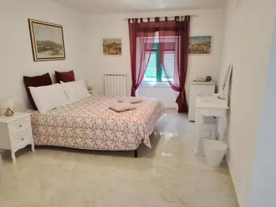 Letto o letti in una camera di ANITA B&B