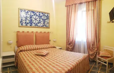 Letto o letti in una camera di Albergo Ristorante Belvedere