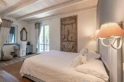 Letto o letti in una camera di Villa Valentina