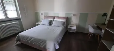 Letto o letti in una camera di Agriturismo Tenuta Valletti.