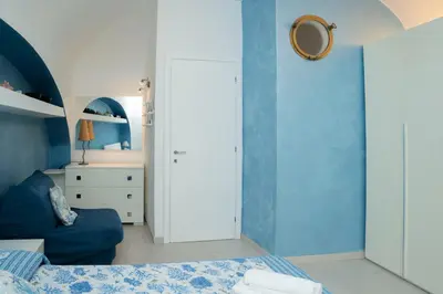 Letto o letti in una camera di 063 - Casa del Corso, Centrale 200m dal mare e spiaggia