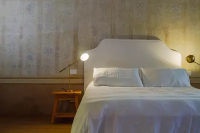 Letto o letti in una camera di Palazzo Glori 6