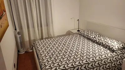 Letto o letti in una camera di Appartamento di fronte all'ospedale