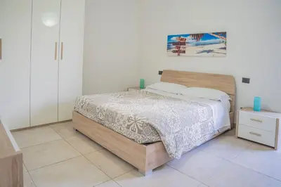 Letto o letti in una camera di 065 - VILLA LETIZIA, Elegante 2 PISCINA e Natura, 10 minuti da MARE e SPIAGGIE