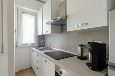 Cucina o angolo cottura di JOIVY Banfi Apartment