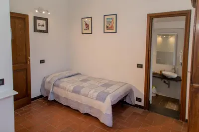 Letto o letti in una camera di L' Amandola