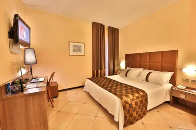 Letto o letti in una camera di Best Western Hotel Libertà