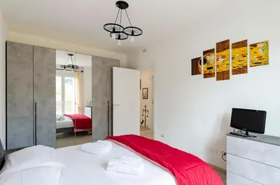 Letto o letti in una camera di JOIVY Flat with Terrace & Parking