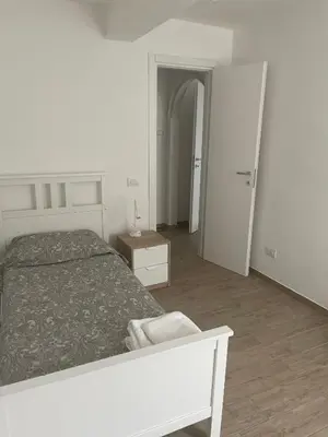 Letto o letti in una camera di Al Battistero
