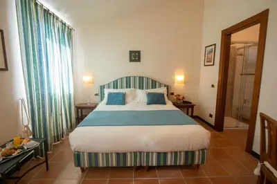 Letto o letti in una camera di Hotel Al Terra Di Mare