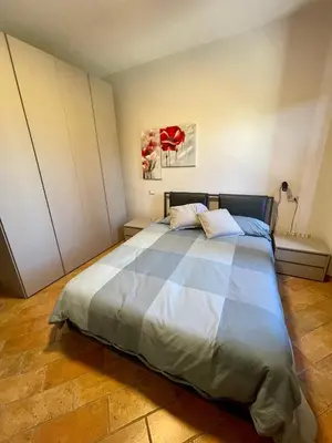 Letto o letti in una camera di Agriturismo Boschetto