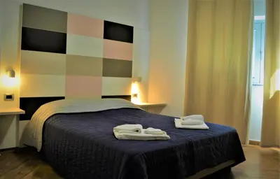 Letto o letti in una camera di Master Hotel