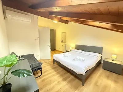 Letto o letti in una camera di Nuvola di Parma// del Ducato 1