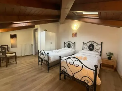 Letto o letti in una camera di Nuvola di Parma// del Ducato 1