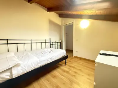 Letto o letti in una camera di Nuvola di Parma// del Ducato 1