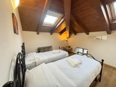 Letto o letti in una camera di Nuvola di Parma// del Ducato 1