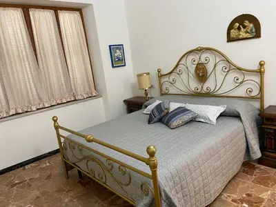 Letto o letti in una camera di LA MOTOCICLETTA