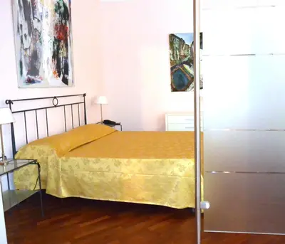 Letto o letti in una camera di Residence Alcorso