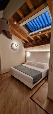 Letto o letti in una camera di Cà Uberti Palace Hotel, MantegnaHotels