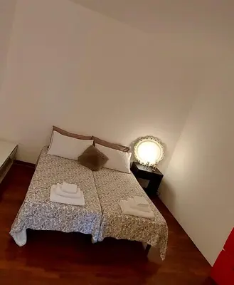 Letto o letti in una camera di Il sole