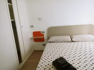 Letto o letti in una camera di Casa Artemisia