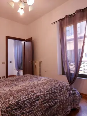 Letto o letti in una camera di Loft Garibaldi