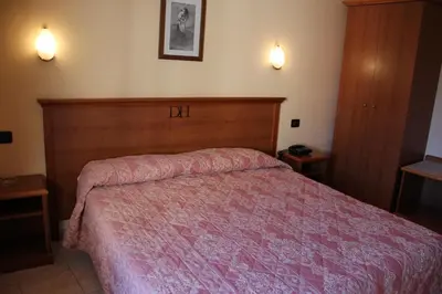 Letto o letti in una camera di Demy Hotel